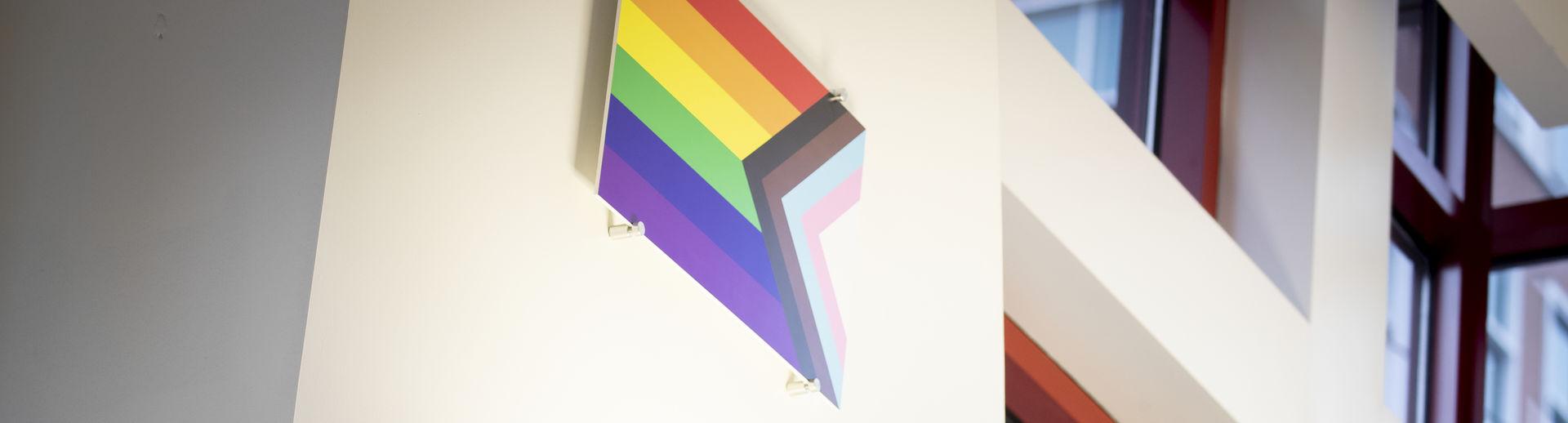 The pride flag hangs in the student center of Temple University.